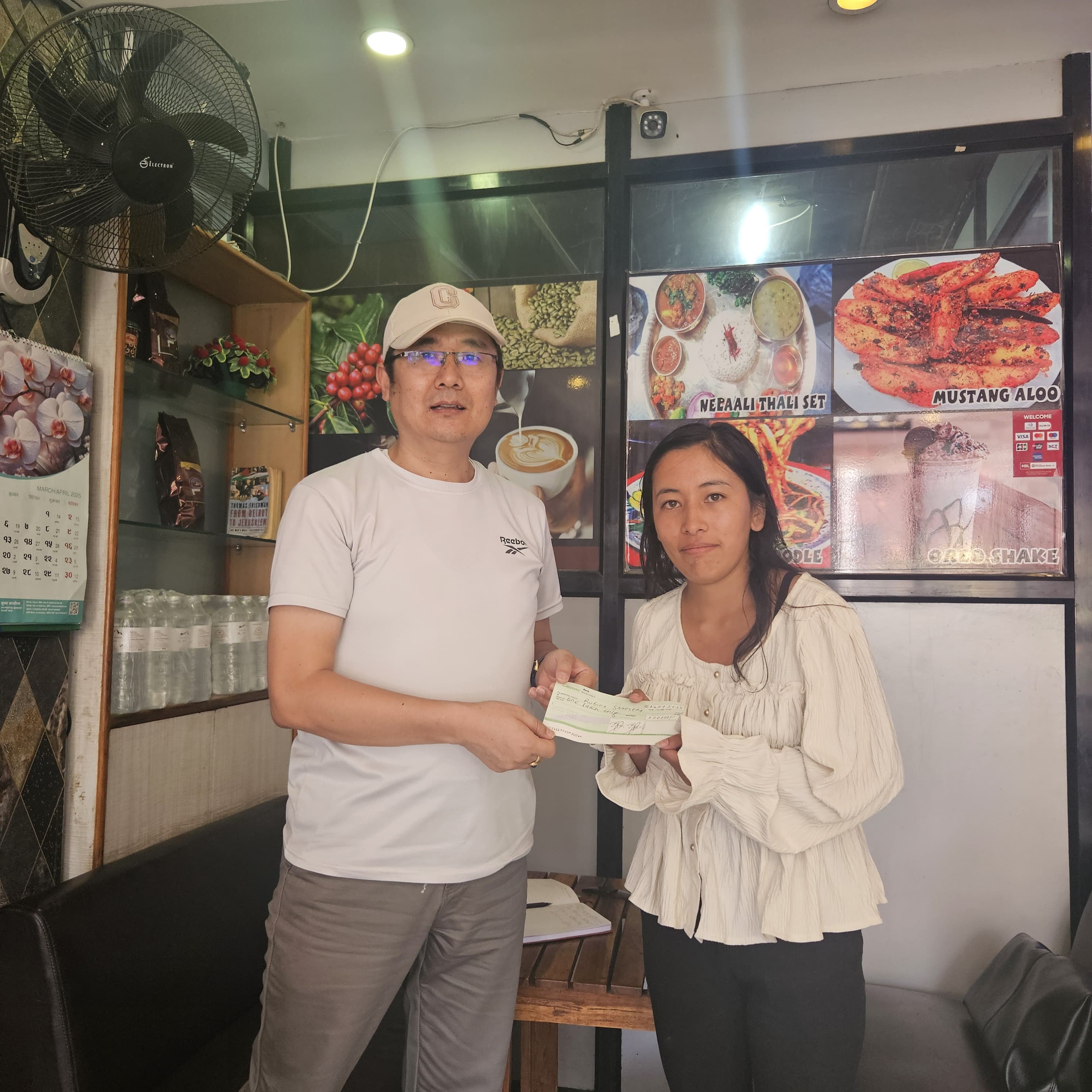 Scholarship handed over to Ms. Rubina Shrestha from Solukhumbu